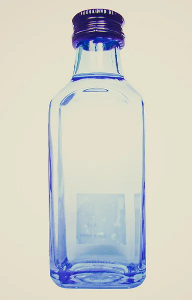 Butelka alkoholu w stylu retro — Zdjęcie stockowe