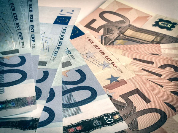 Regard rétro Euro bankonotes fond — Photo