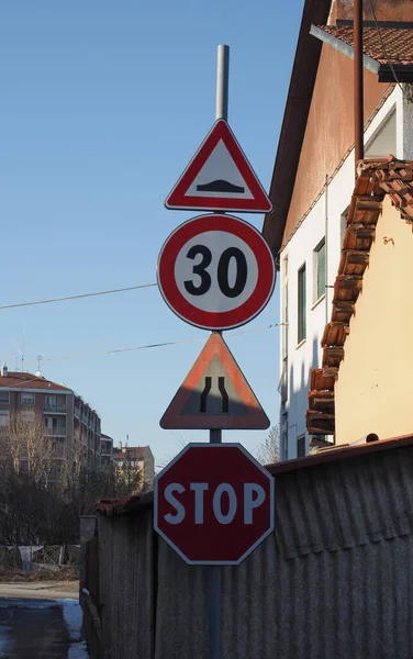 Pole Many Traffic Signs Including Uneven Road Speed Limit Road — Foto Stock