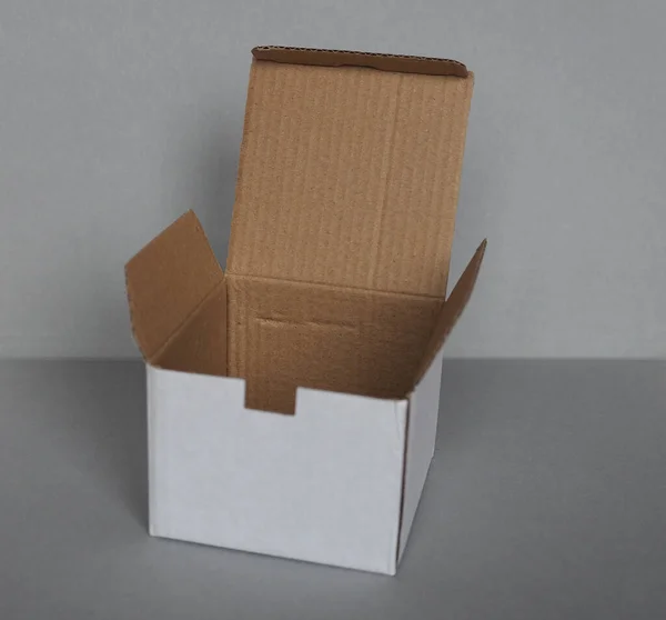 Empty Cardboard Box Front Grey Wall — Stock Photo, Image