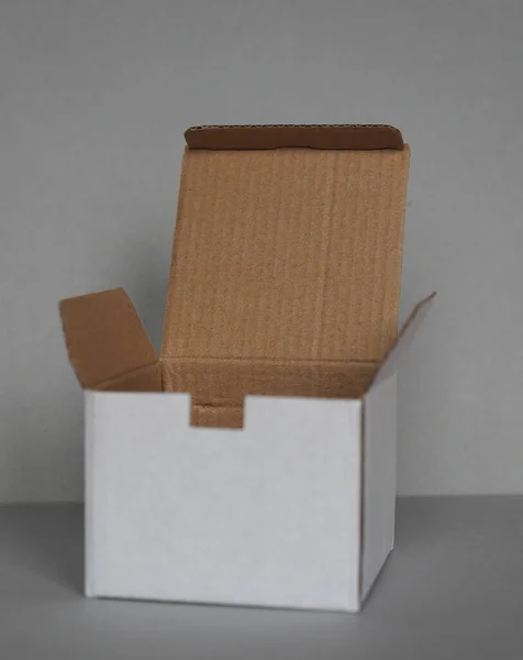 Empty Cardboard Box Front Grey Wall — Stock Photo, Image