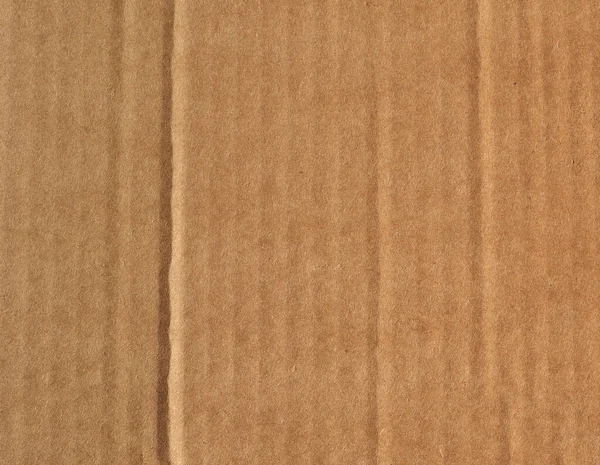 作为背景的褐色波纹纸板质感 — 图库照片