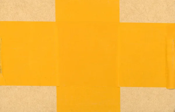 Kahverengi Kıvrımlı Karton Sarı Yapışkan Bant Deseni Arka Plan Olarak — Stok fotoğraf