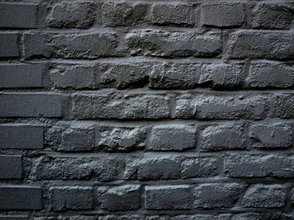 Grunge endüstriyel siyah tuğla duvar arka plan olarak kullanışlı