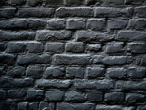 用作背景材料的工业黑砖墙 — 图库照片