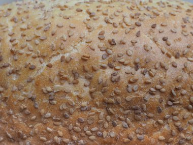 susam tohumları un hamuru ve fırında pişirilmiş sudan hazırlanmış ekmek.