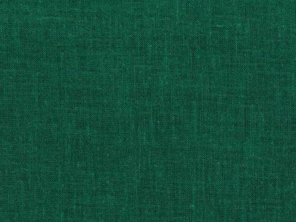 dark green cotton fabric texture useful as a background