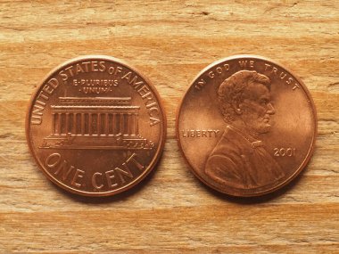 Lincoln 'un portresini gösteren bir dolarlık para birimi Lincoln Anıtı' nı ters gösteriyor.