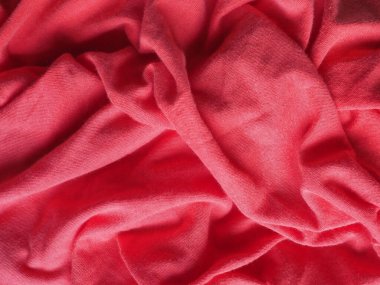 Buruşmuş kırmızı kumaş dokusu arka plan olarak kullanışlı