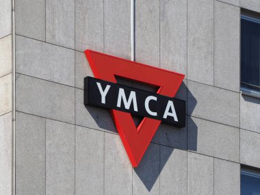 NUERNBERG, GERMANY - CIRCA JUNE 2022: YMCA Young Men Christian Association hostel sign clipart
