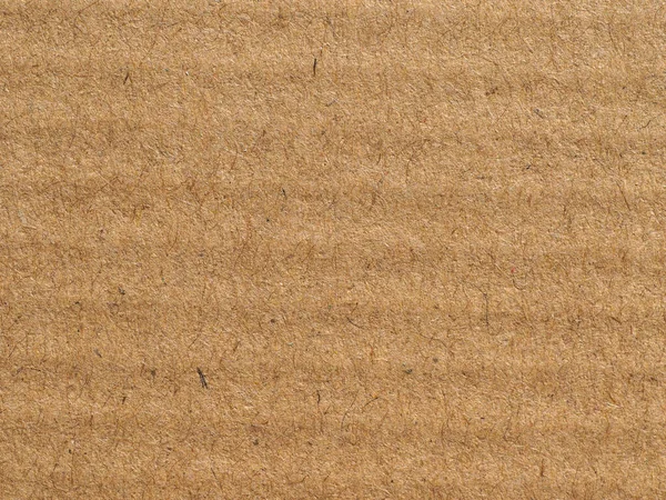 industrial style grunge brown corrugated cardboard texture useful as a background