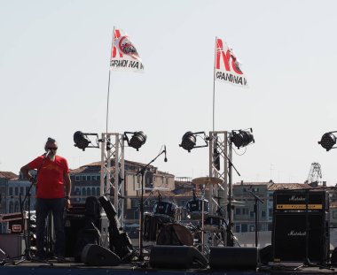 VENICE, ITALY - CIRCA SEPTEMBER 2016: Italian musician Eugenio Finardi speaking at a protest against grandi navi, translation large ships