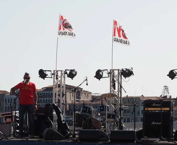 VENICE, ITALY - CIRCA SEPTEMBER 2016: Italian musician Eugenio Finardi speaking at a protest against grandi navi, translation large ships
