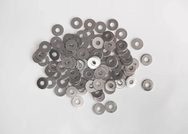 Many Stainless Steel Flat Washers Light Grey Background — Photo