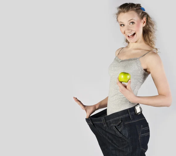 Slender young girl. Isolated over grey background. — Stock Photo, Image