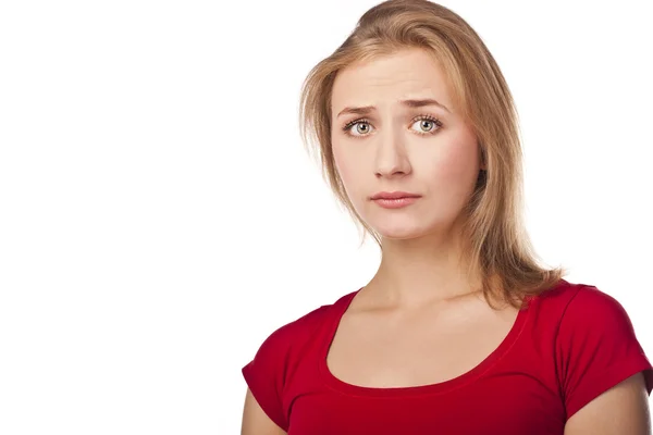 Young frustrated woman in studio — Stock Photo, Image