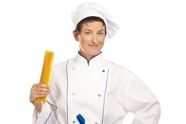 Young chef with fan of spaghetti — Stock Photo, Image