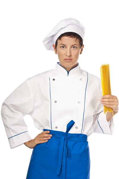 Young chef in the studio. White background — Stock Photo, Image