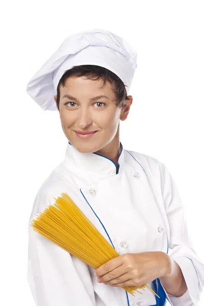 Jonge chef-kok met fan van spaghetti — Stockfoto