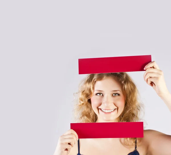 Young beautiful curly blonde in studio — Stock Photo, Image