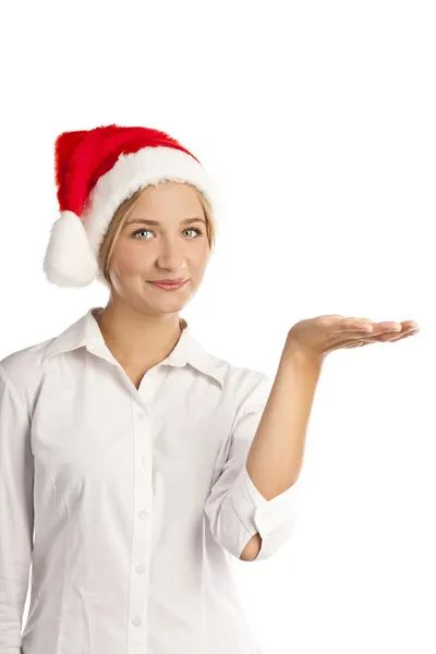 Giovane ragazza in un cappello di Babbo Natale in studio su uno sfondo bianco — Foto Stock