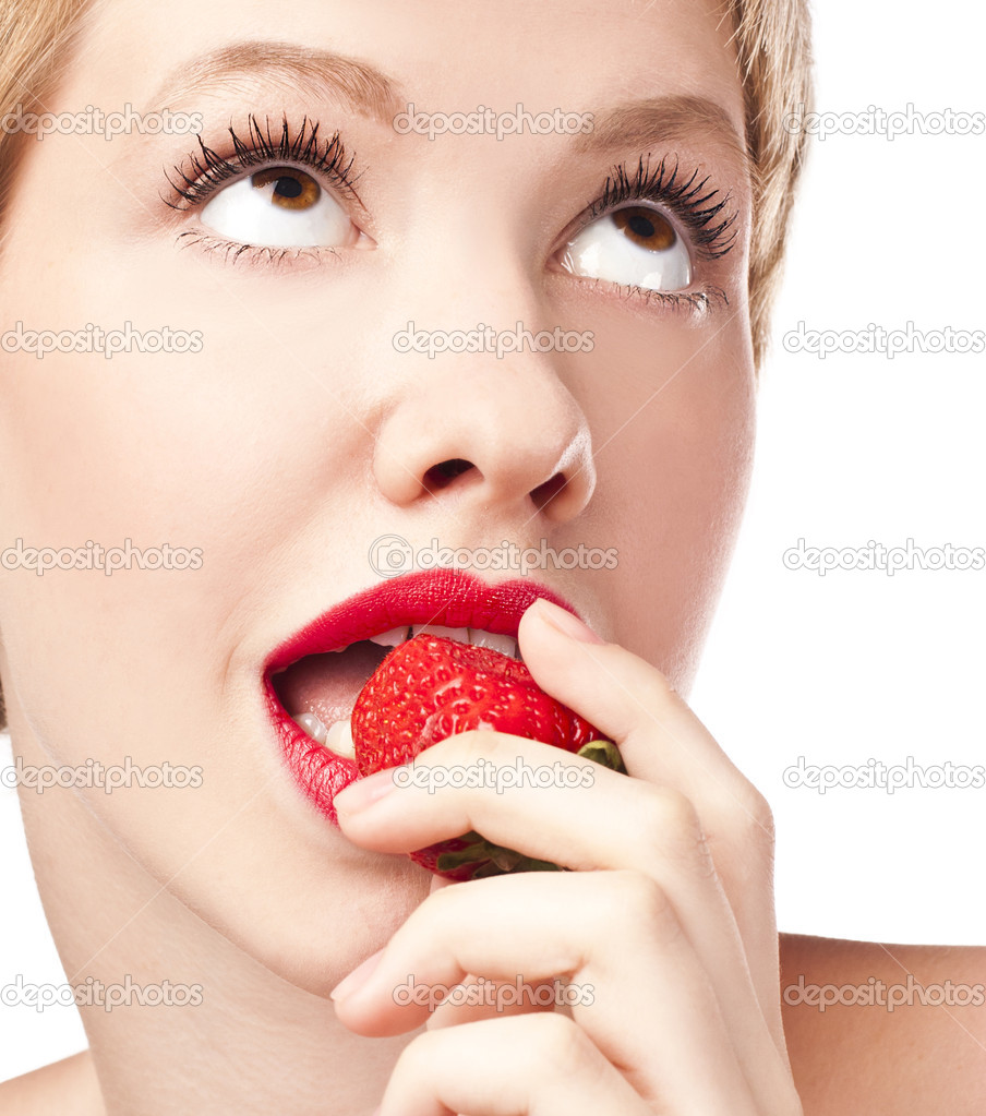The blonde in the studio with strawberries. red lips
