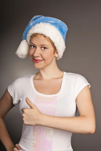 Mulher de Natal de chapéu de Pai Natal. estúdio tiro — Fotografia de Stock
