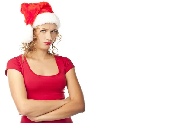 Mujer joven infeliz sobre fondo blanco. Navidad —  Fotos de Stock