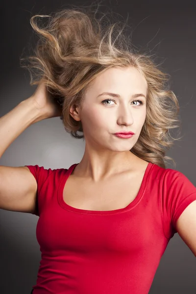 The beautiful blonde woman with red lipstick — Stock Photo, Image