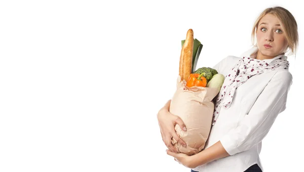 Student with a useful food. Studio white background — Stock Photo, Image