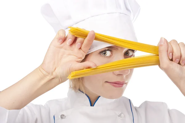 Сook with spaghetti in hands on white background — Stock Photo, Image