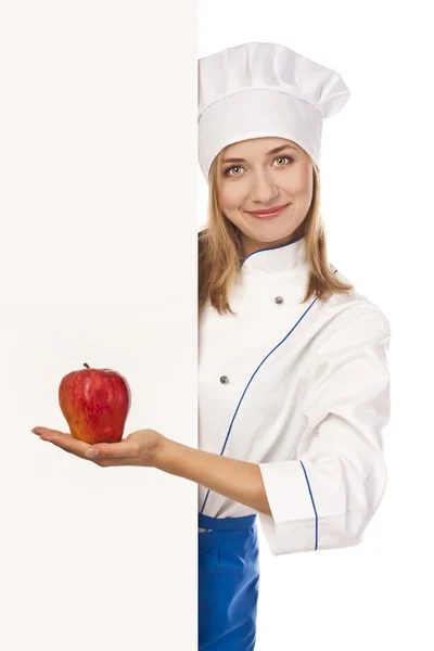 Useful vegetarian food. Young cook in the studio — Stock Photo, Image