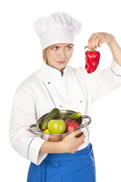 Cook with vegetables at the table, preparing — Stock Photo, Image