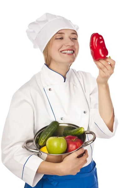 Cook with vegetables at the table, preparing — Stock Photo, Image