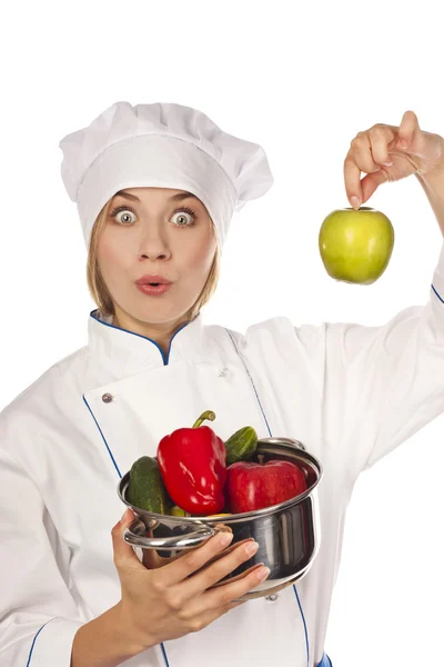 Portret van smiley vrouwelijke cook in uniform — Stockfoto