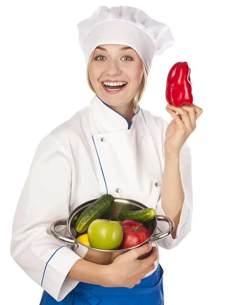 Cook holds pepper. studio Stock Picture