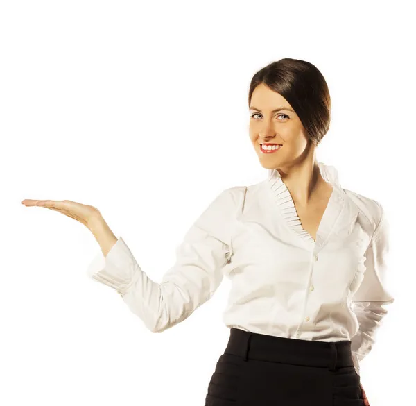 Portrait of young woman showing a product. empty copy space — Stock Photo, Image