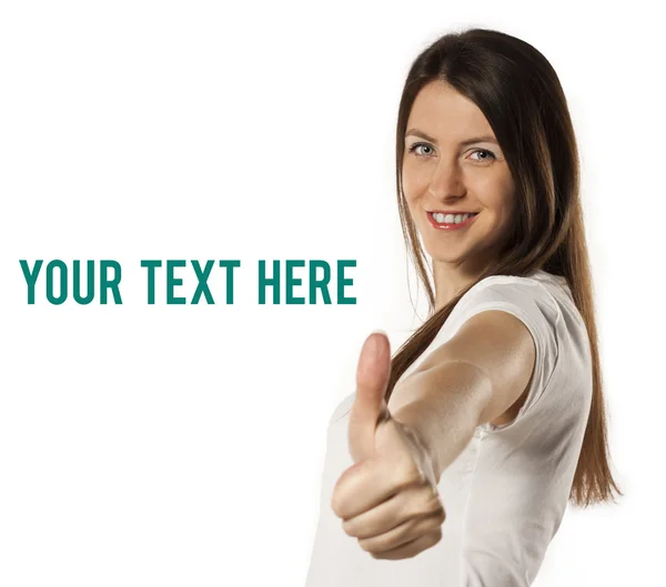 Laughing woman in white t-shirt showing thumbs up — Stock Photo, Image