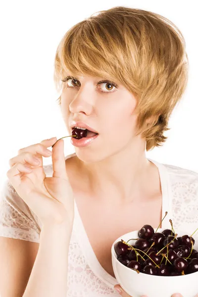 Mujer feliz con cerezas sobre blanco — Foto de Stock