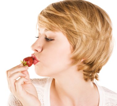 blonde with strawberries. studio