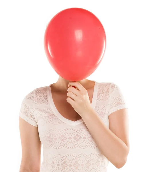 Joven chica feliz con globo para fiesta de cumpleaños sobre un fondo blanco — Foto de Stock