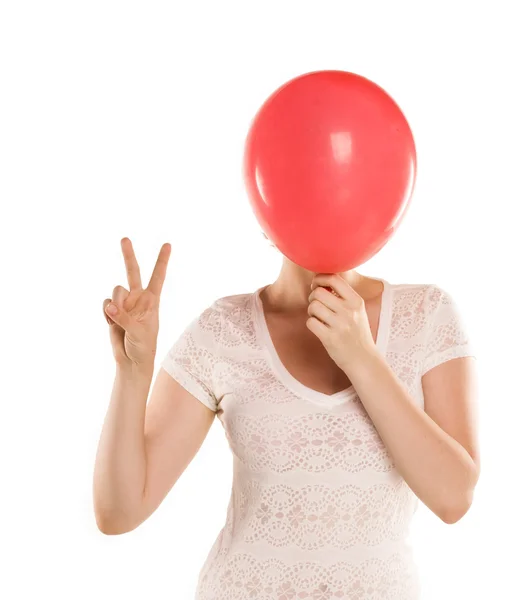 Девушка с красным шаром — стоковое фото
