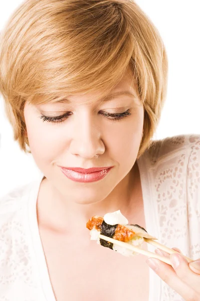 Cute blond woman with sushi and roll — Stock Photo, Image