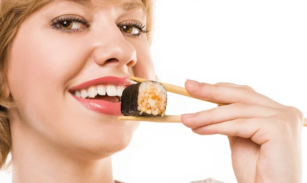 Student isst Sushi — Stockfoto