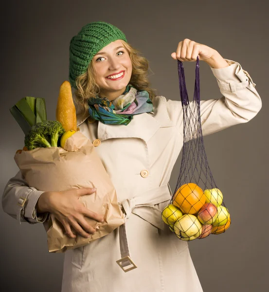 Young mother with food — Stock Photo, Image