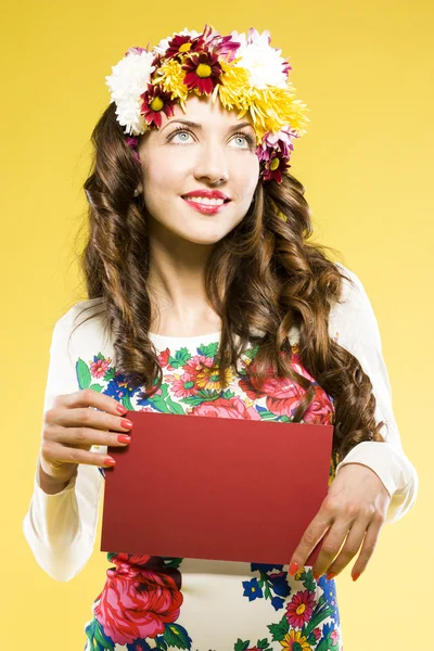 Elegante kapsel met bloemen. vrouw — Stockfoto