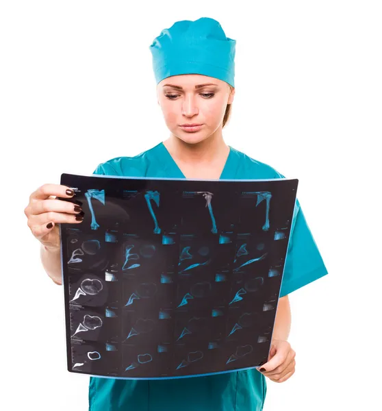 Female doctor looking at an x-ray — Stock Photo, Image