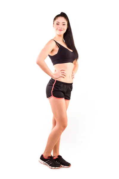 Studio portrait of a beautiful laughing sporty woman — Stock Photo, Image