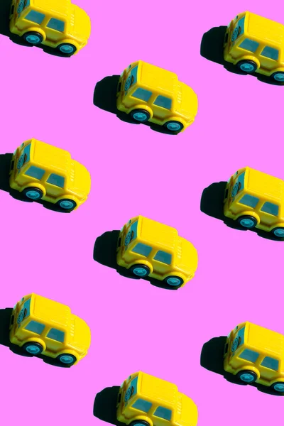 pattern of yellow cars on pink