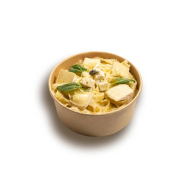 pasta with different types of cheese (parmesan, gorgonzola, camembert) in a box on a white background